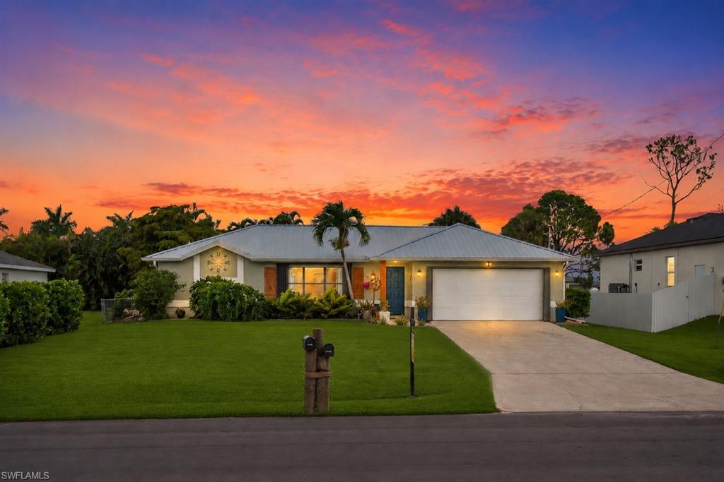 Welcome to this beautifully updated home in NW Cape Coral, where comfort, style, and peace of mind come together. Major improvements include a 2023 metal roof with skylight, new soffits, and gutters surrounding the entire home. Inside, you’ll find luxury vinyl plank flooring throughout with no transitions or seams, freshly painted interiors and exteriors, recessed lighting, and Hunter ceiling fans that create a bright, modern feel.
The remodeled kitchen features Level 4 granite countertops, premium Moen and Kohler fixtures, and GE and LG appliances, making it both functional and stylish. Both bathrooms have been tastefully remodeled, and the home is equipped with updated plumbing (2000), offering added confidence for years to come.
Additional features include hurricane shutters, a brand-new garage door with new opener and springs, a sprinkler system, and a spacious fenced backyard perfect for pets, play, or entertaining. The garage is enhanced with built-in shelving and a workbench, providing excellent storage and workspace.
With all the major updates already completed, this meticulously maintained home is ready for its next owner to move in and enjoy the Florida lifestyle. Perfect for a first-time home buyer, investor, or seasonal living.