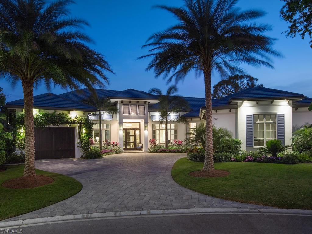 The prettiest house on the prettiest street in Pelican Bay! This 2016 British West Indies estate home features an open concept living at its finest. Filled with natural light, hardwood floors throughout, soaring ceilings and a beautifully furnished interior. This home lives like a sophisticated beach retreat. The outdoor living space is the crown jewel of the home, overlooking oversized lap pool with infinity edge spa, TV, fireplace, and lushly landscaped spacious SW exposure. Four en-suite bedrooms, light-filled office, a chef’s kitchen with top-of-the-line wolf and subzero appliances, unique side yard with fire pit and outdoor shower are just some of the many features that make this home a stand out. Beautifully furnished, this home is ready for you to move in today. Generator, remote control lanai screens, and shutters, outdoor kitchen, Sonos sound system, wet bar... simply no detail overlooked. Pelican Bay offers unmatched amenities: 3 miles of white sandy beaches, 2 beachfront clubs, a challenging tennis program, kayaking, miles of bike paths. Memberships to The Club Pelican Bay featuring 27 holes of golf are still available. It’s a lifestyle.