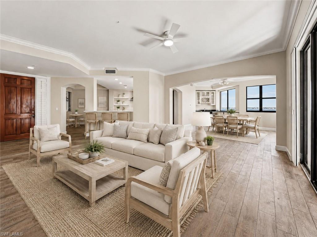 Rare 5th-Floor End Unit | Unobstructed River Views | Alhambra II Floorplan Experience luxury high-rise living at its finest in Palmas Del Sol, located within the prestigious Gulf Harbour Yacht & Country Club. This remodeled 5th-floor end unit showcases panoramic views of the Caloosahatchee River, the 3rd fairway, and the downtown skyline, offering a truly elevated lifestyle. Residence Highlights: Remodeled Chef’s Kitchen: Custom cabinetry, quartz countertops, center island, and a wet bar with matching quartz surfaces—perfect for entertaining. Spacious 2-Car Enclosed Garage: Under-building and conveniently located on the 2nd level. Expansive Lanai: Ideal for relaxing or hosting guests, complete with hurricane shutters for added protection and peace of mind. Primary Suite Retreat: Enjoy lanai access, a remodeled ensuite bath with dual sinks, and a spa-inspired walk-in shower with dual showerheads. Guest Accommodations: Two generously sized guest bedrooms share a full bath with a shower/tub combination. Elegant Finishes Throughout: 8-ft solid core doors, crown molding, and stylish flooring enhance the refined ambiance. Community & Building Enhancements: Recent upgrades include new roofs, exterior paint, garage improvements, and new screens—all fully funded and 100% covered by insurance. Enjoy resort-style amenities: sparkling pool and spa, gas grills, community room, billiards, and a private conference room. Scenic riverfront boardwalks provide the perfect setting for peaceful evening walks. Private memberships available for a separate purchase to enjoy all the amenities that Gulf Harbour has to offer. Don’t miss this rarely available end unit in one of Gulf Harbour’s most sought-after towers. Schedule your private showing today and be sure to view the amazing walk-through video!