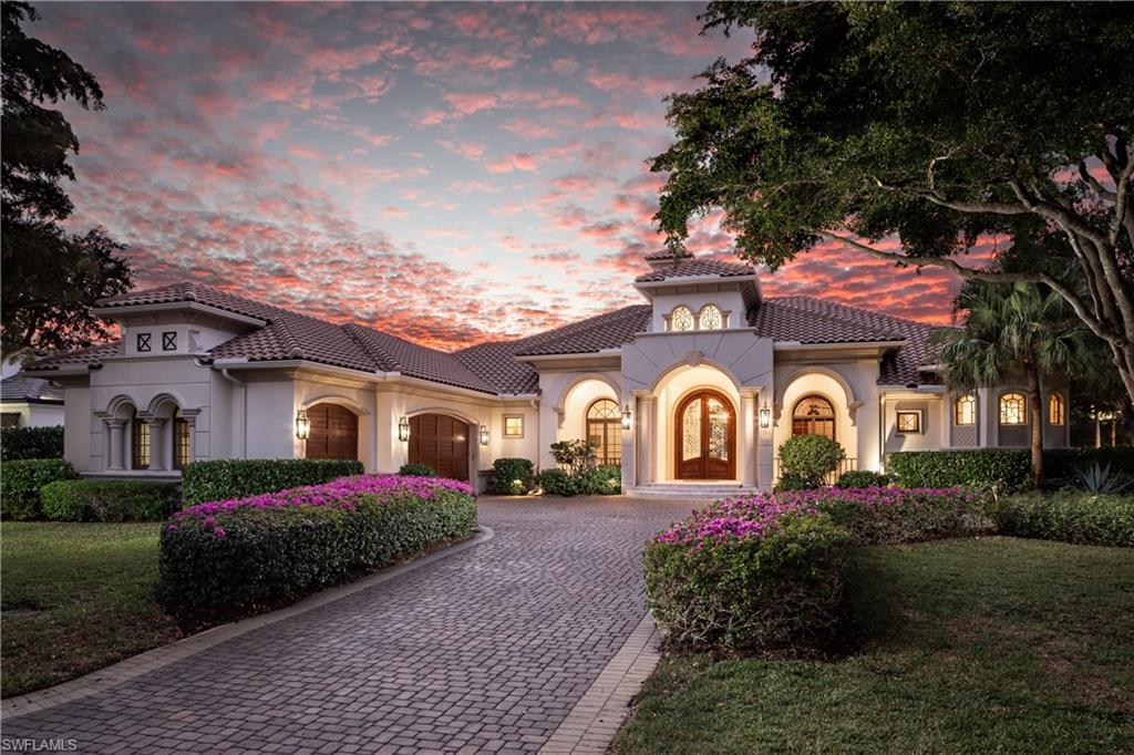 Welcome to 23821 Tuscany Court—a true estate residence tucked inside the prestigious community of The Colony Golf and Country Club in Pelican Landing, where architecture, craftsmanship, and lifestyle converge at the highest level. This custom built Estate home by McGarvey Custom Builders is a 4911-square-foot masterpiece, the definition of quiet luxury—designed for those who appreciate scale, elegance, and thoughtful detail at every turn. From the moment you arrive, the home commands attention with its stately presence, serene water features, and timeless architectural lines. Inside, soaring ceilings with intricate detailing draw your eye upward, while a double-sided fireplace anchors the living spaces with warmth and drama. Every room flows effortlessly, yet each feels intentional—crafted for both grand entertaining and refined everyday living. The chef’s gas kitchen, outfitted with cabinet-front appliances and custom finishes, opens seamlessly to the heart of the home, making it equally suited for entertaining, whether it be intimate dinners or unforgettable family gatherings. This residence offers 4 spacious bedrooms, 4.5 baths, a private den with custom built-ins, a formal dining room that opens to a courtyard garden, and a wet bar, all wrapped in rich millwork, marble flooring, and designer finishes throughout. Triple sliders take you from the indoor to the outdoor living and fill the home with natural light and tranquility. Step outside and experience a private resort of your own: a grand pool and spa, expansive paved lanai, outdoor kitchen with a seated bar, and living room space with a gas fireplace, built-in grill, and a separate cabana—all set against a backdrop of lush landscaping and peaceful water views. Whether hosting under the stars or enjoying a quiet morning by the pool, this space was built to impress and entertain all your family and friends.
Located within Tuscany Isle, one of The Colony’s most exclusive enclaves, this estate delivers access to world-class amenities, a private 34-acre beach park with private boat shuttle transportation to and from the island, waterfront dining at The Bay Club, private kayak park, pickleball, bocce ball, tennis, championship 18-hole golf, and an unmatched Southwest Florida lifestyle.
A legacy property. One of the rare opportunities to own one of The Colony’s finest estates. Don’t miss this opportunity to live in paradise. The best location, with dining and shopping at Coconut Point Mall just across the street, minutes to Naples, Waterside shops, and minutes to Southwest Regional International Airport!