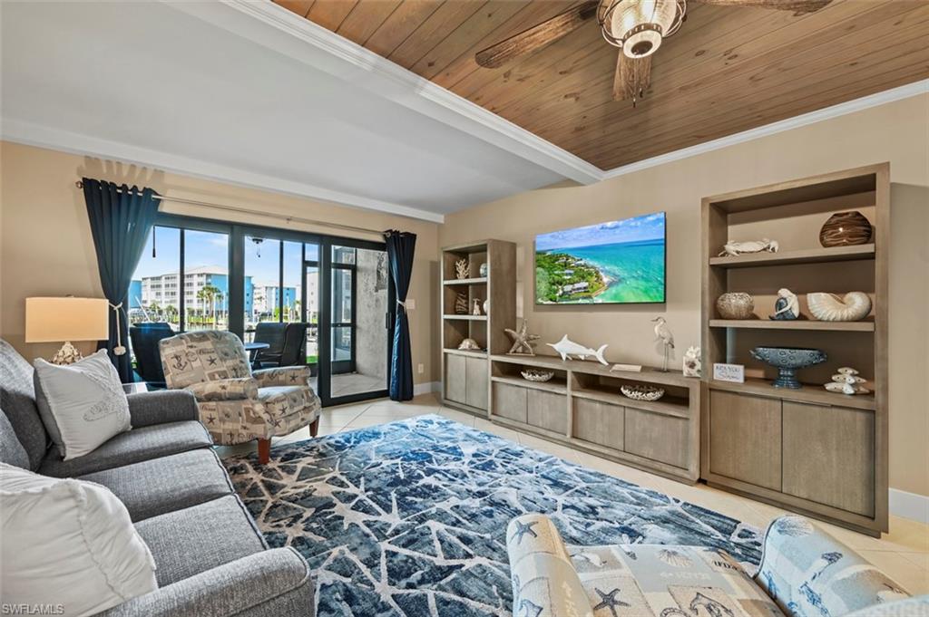 Location, location, location! Situated on the highly desirable south end of Fort Myers Beach, this beautifully upgraded waterfront condo offers the ultimate island lifestyle with an unbeatable walkable location. Just steps from the beach, Santini Plaza, CVS, Fishtail Marina, Freedom Boat Club, dining, shopping, and entertainment, you'll love the convenience and endless opportunities for fun right outside your door.

Whether you're searching for a personal island retreat, an investment property, or the perfect combination of both, this condo checks all the boxes with weekly rentals permitted. Inside, you'll find a thoughtfully updated interior featuring luxury vinyl plank flooring, granite countertops, new vanities, new cabinetry throughout, all-new appliances, and stylish designer furnishings. Impact sliders and a new AC too!  Best of all, it is being offered completely TURNKEY, allowing you to start enjoying island life from day one.

Unwind on the sunny southern-facing lanai and take in the peaceful waterfront views as boats glide through the no-wake zone. Watching the daily parade of boats, dolphins, and manatees has become a favorite pastime for residents lucky enough to call this special place home.

Nestled within Estero Island Yacht & Racquet Club, a waterfront community situated on one of the widest canals on Fort Myers Beach, you'll enjoy an exceptional setting where marina activity and abundant wildlife create an ever-changing waterfront backdrop. Community amenities include a waterfront pool, laundry facilities, and two additional waterside lounging and grilling areas designed to maximize the incredible views.

From watching boats drift by to sunset walks on the beach, this is more than a condo—it's the island lifestyle you've been dreaming about. Truly a magical place to experience all that Fort Myers Beach has to offer.