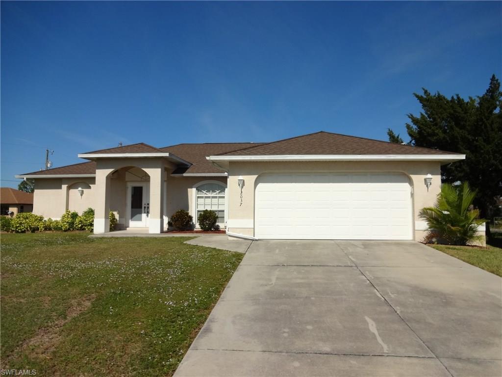 Beautiful 4 bed/2 bath 2 car garage home on corner lot! This home has a very open Great room design, vaulted ceilings, and a large under truss lanai near a Lee County 20/20 preserve. Kitchen features open concept with lots of cabinets, granite counter tops, and an island. The Master suite features a large bedroom with a tray ceiling,  his/her closets, dual vanities and separate tub and walk in tile shower. Laundry room under air includes washer dryer with cabinet storage above. The large corner lot has a sprinkler system.  The a/c system was just replaced.  Home is very easy to show.