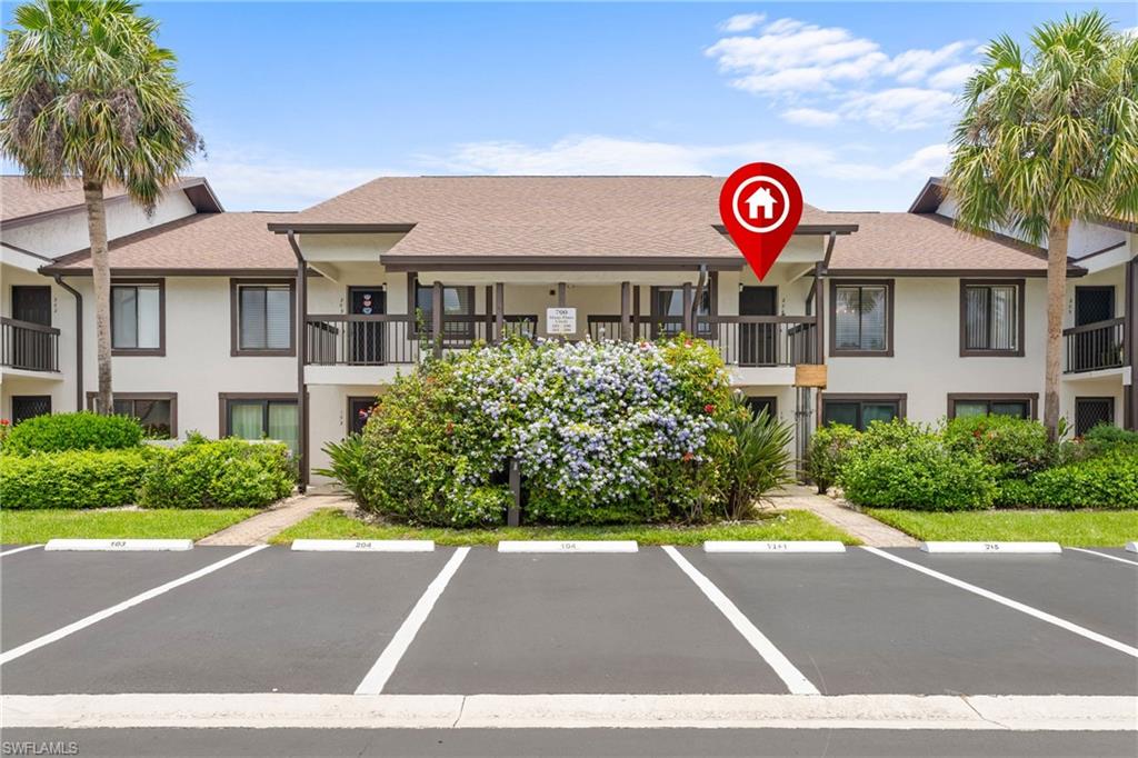 Welcome to this beautifully remodeled second-floor condo in the desirable Misty Pines community within Pinewoods. This 2-bedroom, 2-bath residence offers 1,242 square feet of thoughtfully updated living space with beautiful hardwood floors throughout and granite countertops in both the kitchen and bathrooms.

Enjoy peaceful lake views from your private screened lanai, which also includes a convenient storage closet. Furniture is negotiable, making this home move-in ready for a full-time residence, seasonal retreat, or investment opportunity.

Misty Pines offers two community pools and tennis courts, all in a prime Naples location just minutes from shopping, dining, I-75, downtown Naples, and the area's world-famous Gulf beaches. This beautifully maintained community combines comfort, convenience, and an exceptional Florida lifestyle.