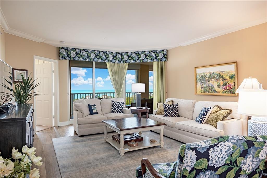 St Raphael Residence 1509 is a three-bedroom three-bath luxury tower residence with 2500 sq. ft. under air,  9' ceilings and amazing views in three directions (east, west, and north).  Wake up to sunrise on the golf course and enjoy the breathtaking view of the sun sinking into the Gulf at the end of the day.  Two deeded parking spaces in the garage directly below the tower are included.  Electric storm shutters have been added to the lanai for convenience.  St Raphael has impact resistant glass on all windows and sliders throughout the building and incredible amenities including the largest pool in Pelican Bay (salt water pool), an incredible fitness center/health club, four suites on the lobby level for overflow guests, social areas for entertaining, and the convenient location for quick easy access to Station 6, the berm, and the boardwalk to the north beach club. Two small pets are allowed at St Raphael.  Enjoy the convenience and security of luxury tower living and the incomparable Pelican Bay lifestyle with two beach clubs, dining overlooking the beach, attendants to assist with beach chairs, umbrellas, Hobie Cats, and Kayaks, trails for walking and biking, tennis, fitness, spa, and world class entertainment at ARTIS at the south end of Pelican Bay.  Come for a season and stay for a lifetime.