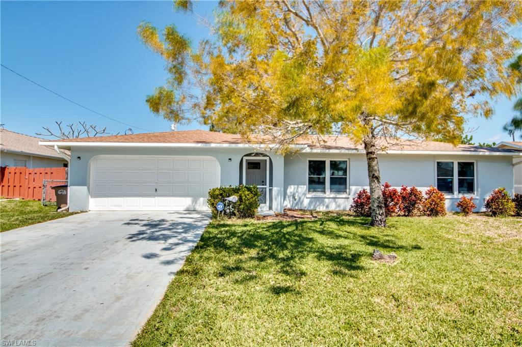 MULTIPLE OFFER SITUATION, HIGHEST AND BEST BY MONDAY MARCH 20 12 NOON. Great 3 bedroom, 2 bathroom 1500 sq ft. pool home in centrally located and popular SE Cape Coral residential neighborhood. All assessments are in and paid. Tiled floors throughout the house, laminate floors in all 3 bedrooms. Newer Stainless steel GE appliances in kitchen off dining room area. Very spacious living room in front area as you walk in. Split floor plan with 2 bedrooms on one side and spacious master bedroom on other side. Master bathroom has step in shower, second bathroom with shower tub combo and access to pool area. House has recently been freshly painted inside and outside. Fantastic Pool area completely screened in, large lanai with outdoor TV, large pool, new pool pump and removable child fence for around pool. Pass through window from kitchen.  Still lots of back yard available for play area and / or pet area. Property is completely fenced in. 2 car garage. Easy to show.
