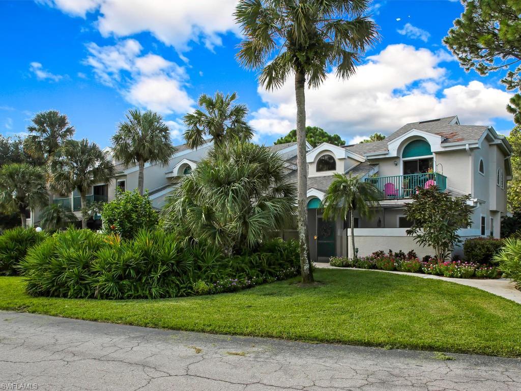 A secluded tropical get-away in the heart of North Naples!! Enjoy the lush foliage and quiet environment of this beautiful 2-bedroom/2.5-bath condo, while also having incredibly easy access to some of the best shopping and beaches in the Naples area! The first floor offers an open floor plan and vaulted ceiling, convenient powder room, full-sized laundry, and a large master suite with sliders onto the private screened lanai. Enjoy your morning coffee or evening cocktails with friends in the lanai that's almost as large as the living room! Upstairs is another master suite with balcony, plus a large loft den and huge storage closet. Kitchen has quartz countertops and recent appliances; water heater is brand new in 2019--and moved to the ground floor from the attic; large storage closet on the lanai. And you're across the street from the delightful clubhouse and pool where your friendly neighbors gather for both lively social events and luxurious poolside relaxation!