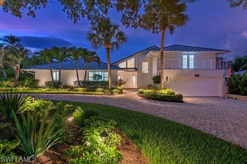 Nestled on an oversized cul-de-sac homesite in the heart of prestigious Park Shore, this beautifully reimagined coastal retreat offers an exceptional blend of privacy, sophistication, and the effortless Naples lifestyle. Thoughtfully renovated throughout, the residence exudes timeless beach-inspired elegance while incorporating modern luxury at every turn.

The expansive primary suite serves as a private sanctuary, recently transformed to include a wet bar, dedicated office, private balcony, dual custom walk-in closets, and its own washer and dryer. The spa-inspired bath is beautifully appointed with quartz countertops, dual vanities, an oversized walk-in shower, and a luxurious soaking tub.

Designed for both everyday living and entertaining, the gourmet kitchen features quartz countertops, a generous wraparound island with breakfast bar seating, double ovens, and a spacious walk-in pantry. Engineered wood flooring flows throughout the home, while a large bonus room provides additional space for gatherings, recreation, or media enjoyment. Hurricane-impact windows and doors offer both peace of mind and energy efficiency.

Step outside to your private tropical oasis, where the backyard has been completely transformed with a newly constructed resort-style pool and spa featuring gas-heated equipment, elegant marble decking, lush landscaping, and privacy fencing. The outdoor setting creates the perfect backdrop for relaxing afternoons and entertaining under the Florida sun.

Ideally located just moments from the finest amenities Naples has to offer, residents enjoy convenient access to Waterside Shops, Clam Pass Beach, Seagate Beach, and the world-class Naples Grande Beach Resort. As a Park Shore resident, you also have the opportunity to join the exclusive Park Shore Beach Park, providing private beach access along one of Naples' most coveted stretches of coastline. Located within the renowned Park Shore community, this exceptional property embodies luxury coastal living at its finest.
NOTE: Seller provided photos/ New photos will be added the week of June 15th please check back.