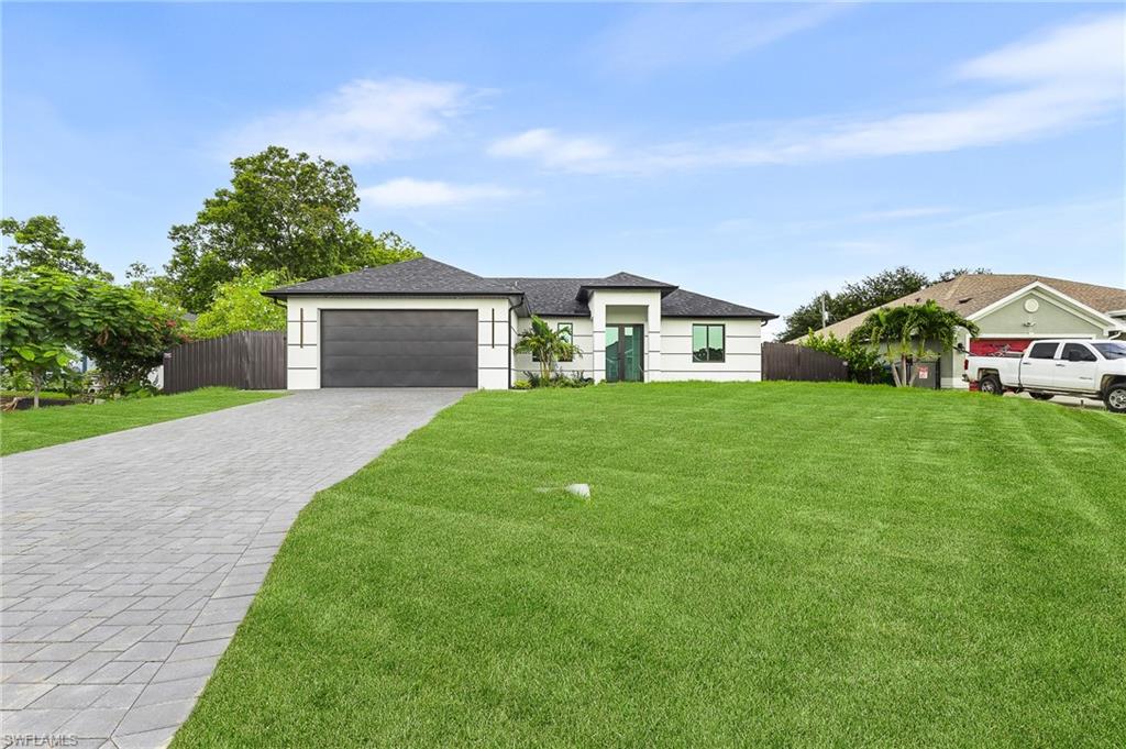Welcome to this stunning new construction in the heart of Cape Coral! This beautifully designed home offers the perfect blend of modern elegance and everyday comfort. Featuring an open-concept floor plan with soaring ceilings, abundant natural light, and high-end finishes throughout, this residence is sure to impress. The gourmet kitchen boasts sleek cabinetry, quartz countertops, a spacious island, and stainless steel appliances, making it ideal for entertaining.
The spacious primary suite offers a luxurious retreat with a spa-inspired bathroom and generous walk-in closet. Large sliding glass doors open to an exceptional outdoor living area where you’ll find a sparkling screened-in pool, perfect for enjoying Florida’s year-round sunshine.
Conveniently located near shopping, dining, schools, parks, and with easy access to major roads, this home combines style, quality, and an unbeatable location. Don’t miss this incredible opportunity to own a piece of paradise in one of Cape Coral’s most desirable areas.