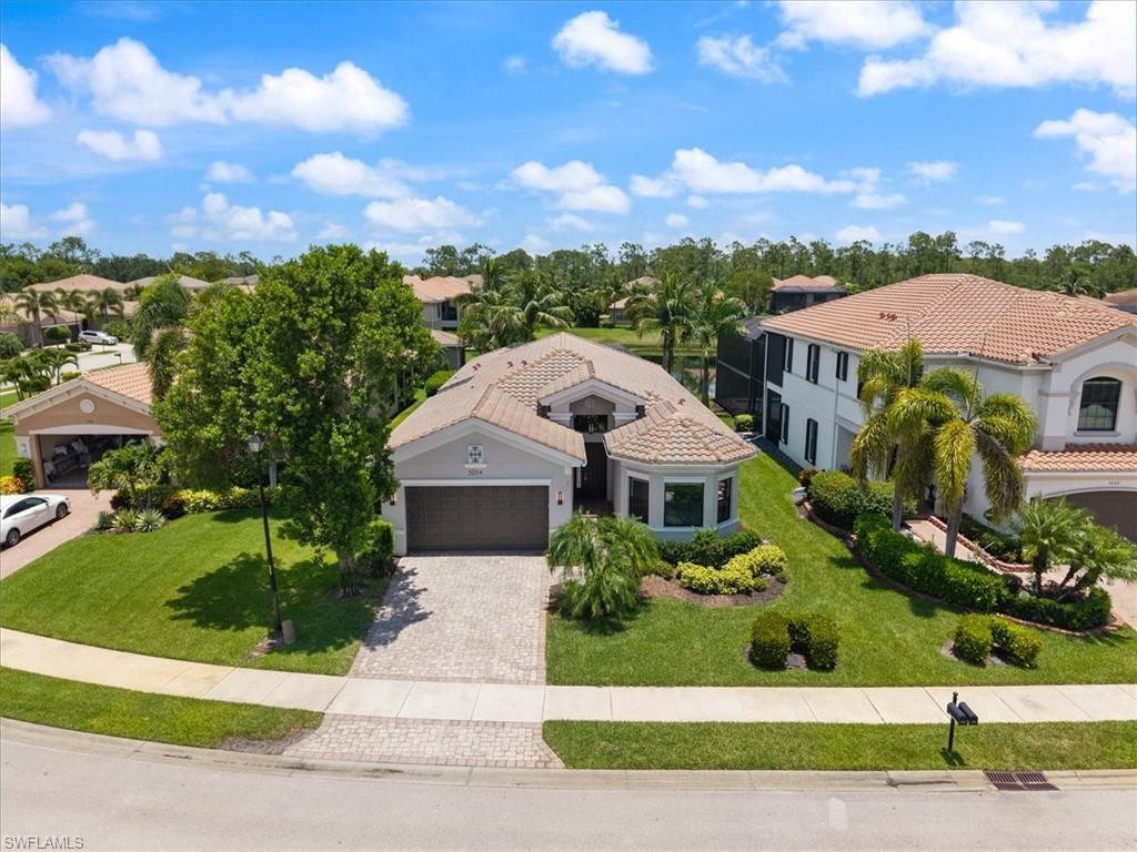 Imagine waking up to this beautiful oasis in the heart of North Naples. Welcome to 3264 Pacific Dr., located in Riverstone, one of Naples’ most desirable gated communities. This is not just a home; it is a lifestyle. Featuring a bright, open floor plan with a sleek, clean, modern design, this 3-bedroom+ DEN, 3-bathroom property is pure perfection.
If you love to entertain, the expansive layout boasts over 2500 sqft of two separate living spaces, perfect for a private media room, a formal lounge, or a secondary living room. Sunlight pours through the high ceilings, bouncing off a flawless mix of tile and brand-new luxury vinyl plank (LVP) flooring. The primary suite is a private retreat, generously sized to accommodate a sitting area, and features dual closets, luxury vinyl plank flooring, and an updated shower. The open kitchen flows effortlessly into your main living areas, leading straight to wide glass sliding doors, perfect for hosting dinner parties. Step outside onto your screened lanai, sit back, and take in stunning, panoramic waterfront views of the lake. This is where you toast to the good life.
When you aren't relaxing at home, you are surrounded by 300 acres of beautiful nature preserves and world-class amenities. The Riverstone clubhouse delivers it all: a resort-style pool, lap pool, hot tub, fitness center, tennis courts, and an indoor sports court. Zero flood zone peace of mind, minutes to I-75, premier shopping and dining at Mercato, and a short drive to the beach.
This is Naples living, elevated. Schedule your tour today!