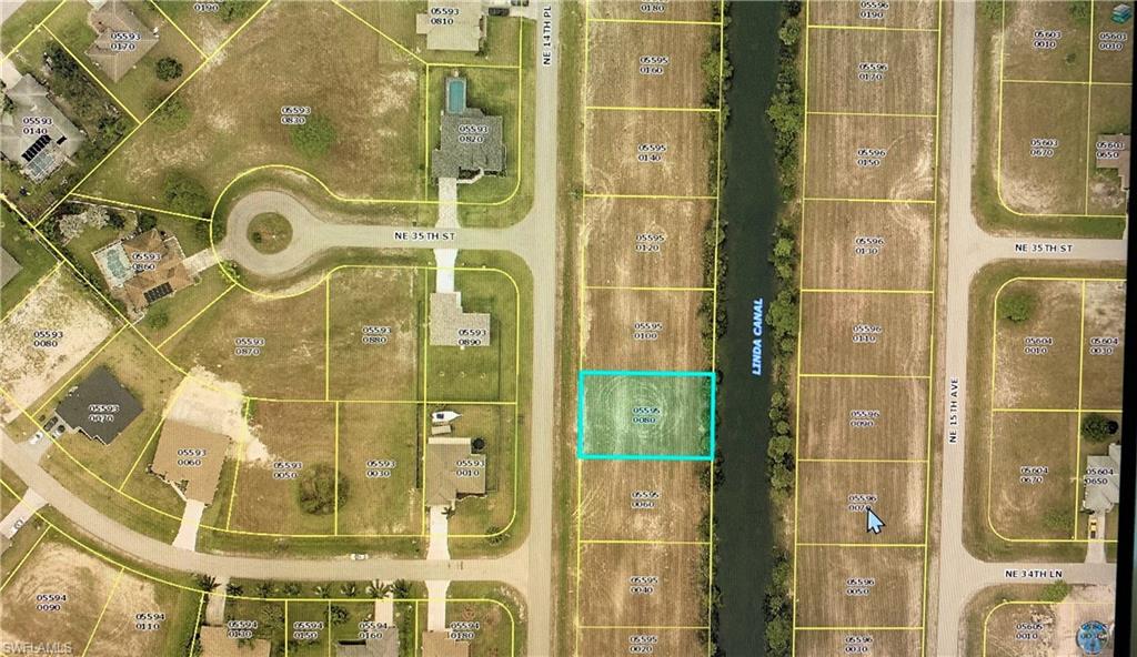 Great FRESHWATER buildable residential site on the Linda Canal in beautiful Gator Circle.   Boating, canoeing or kayaking right off your backyard!  Live on the water and enjoy relaxing rides through all intersecting canals this community has to offer.  This convenient site is a few miles away from schools, shopping, banking, dining and just a few miles from US Hwy 41, I-75, RWS International airport.