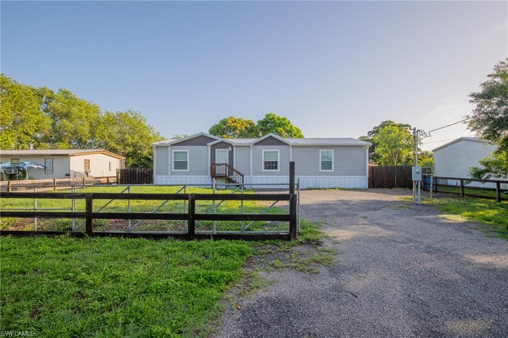 Take a tour to this 3-bedroom, 2-bathroom manufactured home built in 2020, offering modern comfort and peaceful surroundings. Situated on a fully fenced property, this home features beautiful fruit trees and a serene water view, perfect for enjoying Florida living at its finest. Whether you're relaxing outdoors or entertaining guests, this property provides both privacy and charm.