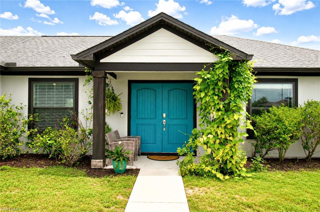 Welcome to this beautifully appointed ranch style home. Situated on an oversized corner lot in Port LaBelle, this home boasts attractive Hardi plank siding, Masonite exterior finishes, and a fully fenced backyard with a beautiful wood privacy fence, which is ideal for outdoor entertaining, pets, or simply enjoying your own private retreat. 
Inside, you'll find an open and inviting floor plan featuring custom cabinetry and doors, granite countertops, stainless steel appliances, a farmhouse sink, and a spacious kitchen island that serves as the heart of the home. A stylish hood vent and ample workspace make the kitchen as functional as it is beautiful. 
The thoughtfully designed split-bedroom layout provides privacy for the primary suite, which showcases a tray ceiling and a luxurious en-suite bath featuring dual vessel sinks and a stunning subway tile walk-in shower. The versatile fourth bedroom offers flexibility as a home office, den, or guest room to suit your lifestyle. 
Additional highlights include a barn door accent, pantry area conveniently located within the laundry room, and quality finishes throughout. With its desirable corner-lot location, modern farmhouse touches, and spacious design, this exceptional home is ready to welcome its next owners.