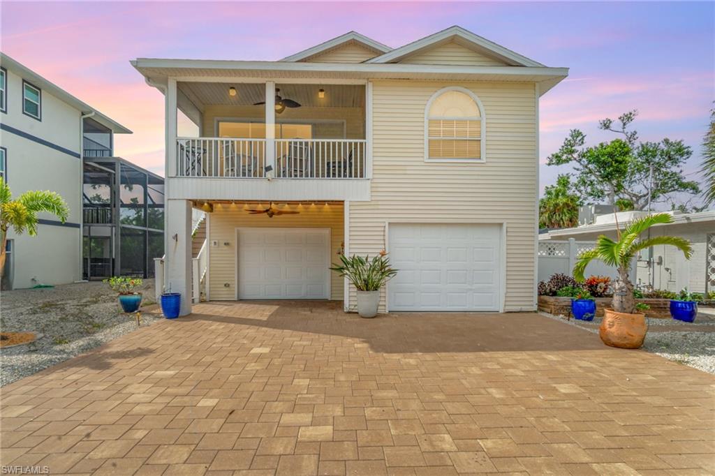 One of the Best Values on Fort Myers Beach!

This property just became an even better opportunity with a newly improved price. If you've been searching for an elevated home on Fort Myers Beach, this is your chance to start living the island lifestyle you've been dreaming about.

Offered turnkey furnished, this well-maintained 3-bedroom, 2-bath home was built in 2002 and features a bright, open floor plan with soaring vaulted ceilings. The updated kitchen is designed for both everyday living and entertaining, showcasing beautiful quartzite countertops, newer stainless-steel appliances, and a convenient breakfast bar.

Step outside to the screened balcony and enjoy a perfect spot for morning coffee or evening relaxation. The spacious primary suite includes dual vanities and a tub/shower combination, while two additional guest bedrooms provide flexibility for family, visitors, or a home office.

Downstairs, an oversized garage offers abundant space for vehicles, beach toys, bicycles, kayaks, and additional storage.

Ideally located in the Shell Mound Park area of Fort Myers Beach, you'll enjoy convenient access to the beach, restaurants, shopping, and all the island amenities that make coastal living so desirable.