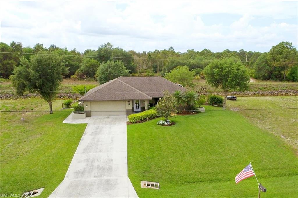 Have you been waiting for a well kept home in Buckingham Park with an extra lot to build a huge garage for an rv, boat, toys, etc or just keep for extra property/investment? This home looks fantastic and the location is excellent being a short distance to all your essential needs. The home is located on the last street of the neighborhood which has very little traffic except your direct neighbors. The curb appeal is excellent and very well manicured. From the moment you walk in the front door you will know this is the one! The split floor plan is excellent with the vaulted ceilings. The yard is oversized with the rear being fenced with concrete at the base of the fence, a shed for extra storage, and still leaving room for a pool. The additional lot included to the right of the home is built high and cleared to the grass. The back of the property backs up to the water run off canal that surrounds the neighborhood which you can enjoy the nature of fish, birds, and turtles. Newer SS appliances with wifi-Fridge, Roof replaced in 2014, A/c replaced in 2017. Not in a flood zone, NO HOA! A very nice home that is move in ready! This home will sell fast! Don't wait until its too late!
