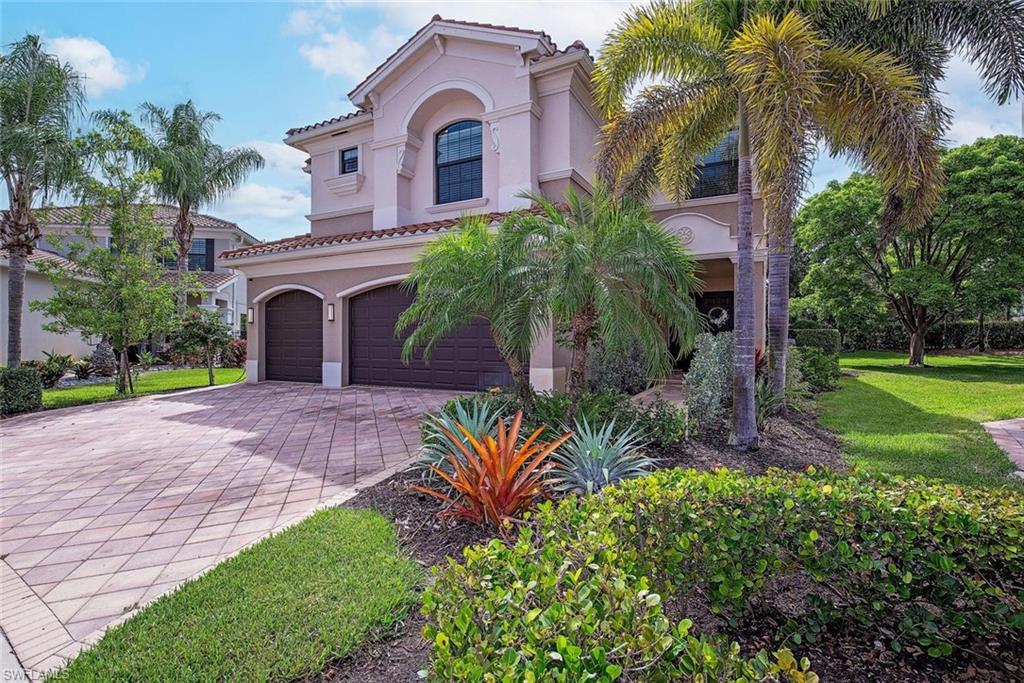 Incredibly rare opportunity to own one of Riverstone's most desirable lots, situated at the end of a quiet cul-de-sac with two generous side yards that simply cannot be replicated on a standard homesite.  Built in 2015 by GL Homes, this meticulously maintained home sits on a 0.26-acre lot with a pool cage, heated pool and is only an easy 5-minute walk to Riverstone’s clubhouse and amenities via a pedestrian bridge through the nature preserve. The popular Shiraz floor plan features 4,184 square feet of living space over two levels with 6 bedrooms, 5 full bathrooms and a 3-car garage.  Large sliding doors off the living room open to a covered screened lanai overlooking the pool and expansive backyard, creating a seamless indoor-outdoor connection perfect for everyday living and entertaining. The updated kitchen features quartz countertops with a waterfall edge island, marble backsplash, painted wood cabinetry, a walk-in pantry, GE appliances, bar seating for four and a casual breakfast area.  A ground-level bedroom serves equally well as a guest suite, home office, or den. Rich wood-look luxury vinyl flooring runs throughout the upper level, complementing the light tile floors below. The primary suite is a proper retreat with dual walk-in closets and a private bath, set apart from the secondary bedrooms for maximum privacy.  The second level hosts four additional bedrooms, three full bathrooms, and a dedicated laundry room. Both HVAC units were replaced in 2025 with 3-ton, 15.2 SEER systems.  -- Riverstone is a gated GL Homes community of 802 homes set across approximately 300 acres of lakes and preserves in North Naples. The 13,000-square-foot clubhouse anchors a full amenity package including a resort-style pool with cabanas, lap pool, children's splash pad, heated spa, five lighted Har-Tru tennis courts, outdoor pickleball, full indoor basketball court, fitness center, yoga studio, and a full-time activities director. The gate is guarded around the clock. Zoned for Laurel Oak Elementary, Oakridge Middle School, and Aubrey Rogers High School. Founders Square, Logan Landing, and I-75 are minutes away, with Naples beaches roughly 20 minutes from the front door.