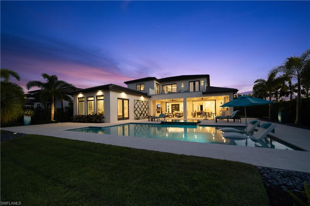 Picture a secluded, private 22 home community nestled between the Gordon River, Greenway and Jack Nicklaus Signature Golf Course convenient to everywhere in Naples. Inside the Landings at Bear's Paw this 4,960 square foot, 4 bedroom, 4 1/2 bath home with deeded dock was meticulously planned for 3 years. From the European Oak Floors, Floating Staircase, and Spectacular Wine Display Wall up to the "Smart Home" Lutron Lighting plus Custom Omega Cabinets every detail was selected to enhance the open, flowing floor plan. The lanai, with outdoor kitchen, phantom screens and pocket sliding doors introduces the sun shelf saltwater pool with spillover spa to an endless all
backyard. The large first floor Master Suite provides the convenience of "ground floor" living while three comfortable bedrooms and second floor entertainment room offer generous accommodations for family and friends. This stunning dream home must be seen to be appreciated.