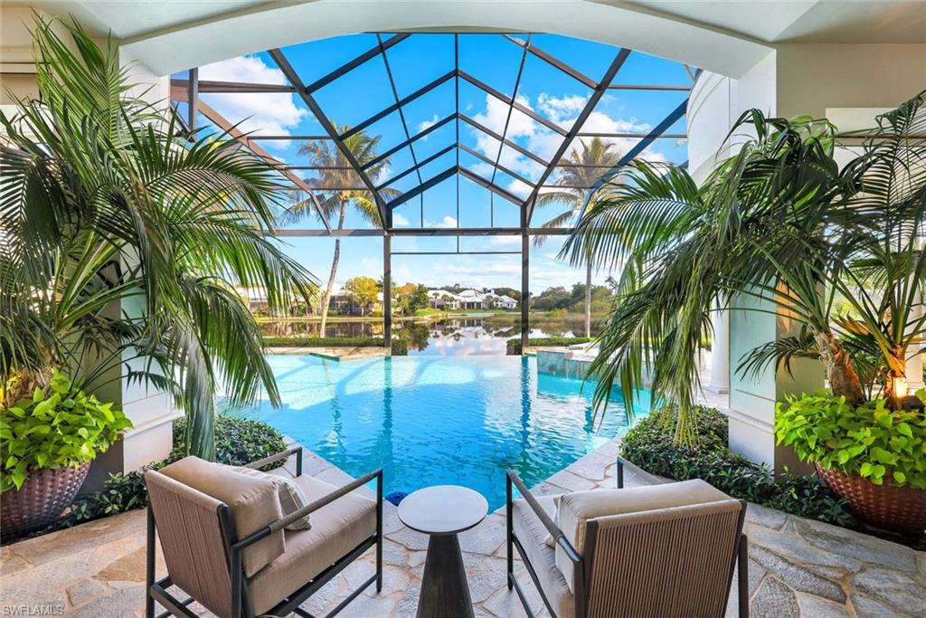 A Masterpiece of Modern Luxury in Bonita Bay — Absolute Perfection
Introducing an extraordinary estate in the heart of prestigious Bonita Bay, where more than 5,000 square feet of completely reimagined living space establishes a new benchmark for luxury living in Bonita Springs, with furnishings optional. This exceptional 4-bedroom, 4.5-bath residence with an oversized 3-car garage has been meticulously transformed from top to bottom, featuring only the finest materials, finishes, and craftsmanship. Every space is purposeful. Every detail is refined.
From the moment you enter, soaring ceilings and expansive open-concept living areas create a striking sense of scale, seamlessly blending architectural elegance with modern sophistication. The designer kitchen is a true centerpiece, complemented by spa-inspired baths and impeccably appointed bedroom suites. For the wine connoisseur, the home showcases a dramatic 600-bottle, climate-controlled wine wall—an architectural focal point and entertainer’s dream.
The outdoor living experience is equally spectacular, featuring a custom-designed pool and a beautifully curated private retreat ideal for both intimate relaxation and grand-scale entertaining. This serene setting is enhanced by the quiet rhythm of nature, where migrating birds—including ibis, heron, and roseate spoonbills—grace the surrounding landscape, creating a peaceful, ever-evolving backdrop that feels both rare and restorative.
Beyond the residence, Bonita Bay offers an unparalleled lifestyle with world-class amenities, including optional championship golf membership, a private beach park, tennis and pickleball, multiple dining venues including a waterfront restaurant, a full-service marina, and miles of scenic walking and biking paths woven throughout this exceptional community.
Located within one of Southwest Florida’s most coveted gated enclaves, this residence presents a rare opportunity to own a truly turnkey, magazine-worthy home. At this level of design, scale, and finish, there is no better value in Bonita Bay. Be sure to experience the virtual tour.
A bold vision. A flawless execution. A home for the most discerning buyer.