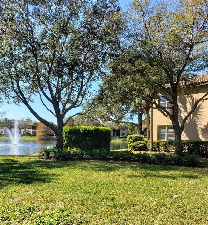 Fabulous location!  Not only is this lovely coach an end unit, it overlooks the park and is directly across the street from the pool.  Combine that with easy walking to the Racquet Center and this property hits all marks!  Well, if that isn’t enough other features include storm shutters on the lanai, 2017 air conditioner, tankless hot water tank, bamboo flooring in the living room, crown molding, updated kitchen appliances, new washer and dryer, California closets in the master bedroom and more!  Come and make this lovely coach home yours!