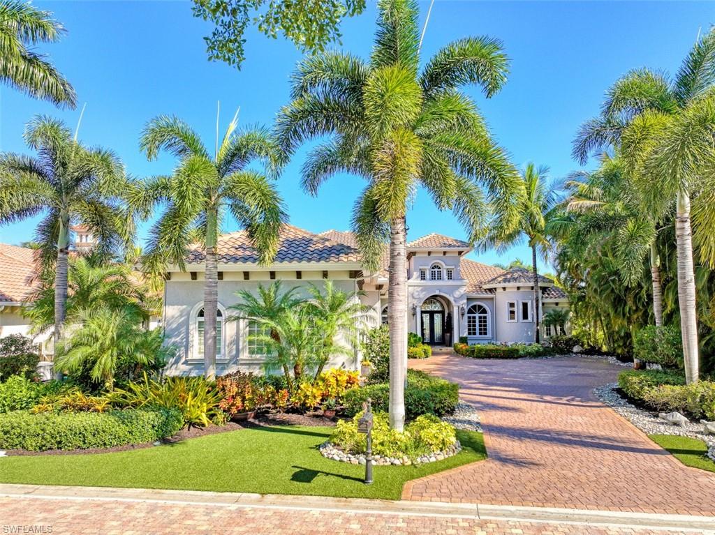 Take in the splendor of this stunning home nestled in the secluded enclave of Bellamare within the Award Winning gated community of Miromar Lakes. This distinctive 5,318 sq. ft. single family, two-story estate home features four bedrooms, 4 1/2 baths, an office/den, massive wine room, whole house generator and a 4 car air-conditioned garage with soaring ceilings and extensive storage. This one of a kind home offers endless personality and differentiates itself from the moment you enter the home with the warmth of travertine and wood floors to the 2 cozy outdoor living areas with gas fireplaces and magnificent pond and panoramic lake views. This home boosts extensive features such as a gracious master suite and 2 first floor ensuite bedrooms, massive upstairs entertaining area complete with pool table, a breathtaking Zero Edge saltwater pool with glass bead interior, fully enclosed backyard with pet-friendly ForeverLawn turf, hurricane protection and a new tile roof in 2018. Two high-efficiency air units installed in 2022 and the other two installed in 2017. Home also features state-of-the-art audio/visual technology. Call for a complete list of the endless upgrades.