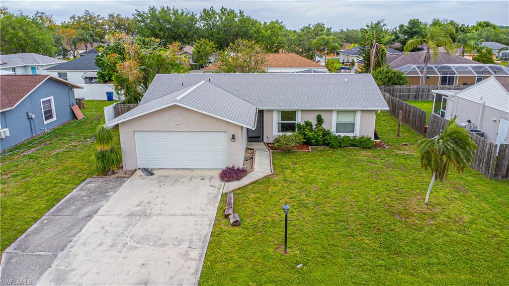 BEAUTIFUL HOME IN BUCKINGHAM!! This is a 3 bed/2 bath home with   NEW ROOF 2023, a Screened lanai, Nice open floor plan. Well-maintained AC and Water heater. All in a peaceful, mature neighborhood with nearby Riverdale Public Library, Park, Restaurants, Riverdale High School, and shopping area. NO FLOOD INSURANCE REQUIRED. A must-see Beautiful House. Schedule your viewing appointment today..