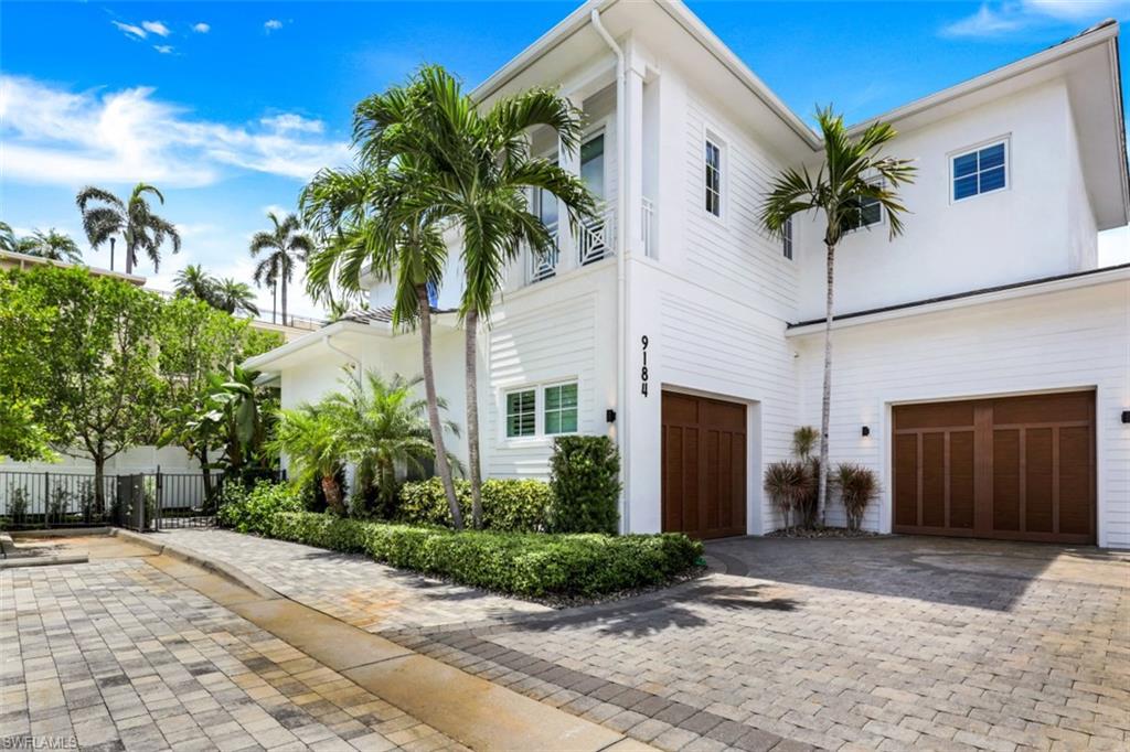 Enjoy luxury living in one of the largest & finest villas offered turnkey at Residences at Mercato. Situated on a rare lot and a half and measuring almost 4,000sf, this stunning property is sure to please the most discerning buyer. Built as the developer’s own residence with unrivaled customization, the villa has been reimagined by an AD 100 Designer & outfitted with the chicest furniture. The sprawling main level of the home features a double-height living room highlighted by an accent wall with fireplace, dining area, and a chef’s kitchen with Wolf appliances, wine storage and covered in lavish Taj Mahal counters. The grand primary suite is also on the main level and includes a spa bathroom with soaking tub and custom closet space. Upstairs, there are three bedrooms each with en-suite baths as well as a large library. The outdoor living area includes a summer kitchen, covered lanai, fireplace, and an oversized pool and spa flanked by a stunning water-wall. Adjacent to the outdoor space is the casita ideal for guests with its morning kitchen and full bath. Residences at Mercato is a private gated community just steps away from the best attractions Naples has to offer.