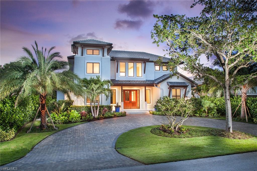 Spectacular new construction designed by MHK Architects and located in the heart of Old Naples. Built to today’s highest standards with CBS construction and poured concrete between floors. Exceptional floor plan with an abundance of privacy for both owner and guests. Open-concept kitchen with Taj Mahal Quartzite countertops, glass tile backsplash and top-of-the-line appliances. Luxurious first-floor master suite with fireplace, dual walk-in closets and Calcutta Gold marble bath. Floating staircase leads to upstairs living area with wet bar, two guest suites and entry to separate guest cabana with kitchenette. Walls of glass pocket back to bring the outside in, perfect for entertaining. Easy access to 5th Avenue South, Third Street, Crayton Cove and Cambier Park.