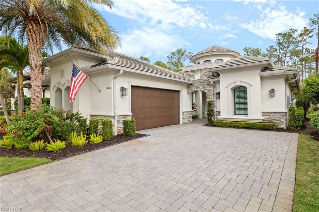 True entertainer's delight! Discover luxury living in this meticulously designed and maintained 3 bedroom plus den, single-family home. Upon entry, you are greeted by a grand foyer that opens into a spacious, airy open floor plan. The heart of the home is an eat-in kitchen. A chef's dream, with top-of-the-line WOLF APPLIANCES, to include; 4-burner gas cooktop with a griddle, wall oven, steam oven, and built-in coffee station. The SUB-ZERO refrigerator flows seamlessly into the matching cabinetry, while the wine cooler completes the serving area with extra sink. This beautiful kitchen is perfect for culinary enthusiasts and casual dining alike. The separate dining room provides an elegant space for hosting dinner parties, flowing seamlessly into the large living area, where luxury finishes accentuate every detail. Retreat to the spacious primary suite, a haven of relaxation featuring dual his/her closets for ample storage. Experience the ultimate in comfort and style, complete with an outdoor kitchen and a luxurious SALTWATER POOL, perfect for entertaining or relaxing in the sunshine. Protect your outdoor furniture with electric hurricane shutters. This home is not just a residence, but a statement of luxury and sophistication, tailored for those who love to entertain and appreciate the finer details. Throughout the home, you'll find solid surface flooring, upgraded light fixtures, and custom cabinetry that add both elegance and functionality. The large two-car side-load garage features 2024 epoxy floor and generous storage capabilities. As part of the intimate and gated community of Sienna Reserve, which consists of just 45 homes, this home is situated on a quiet lot near the beautiful community fountain. Sienna Reserve is in a fantastic location with all that North Naples has to offer, including gated access to North Collier Regional Park, stunning beaches, and shopping destinations like Mercato and Seed to Table. This property truly embodies the best of Florida living!