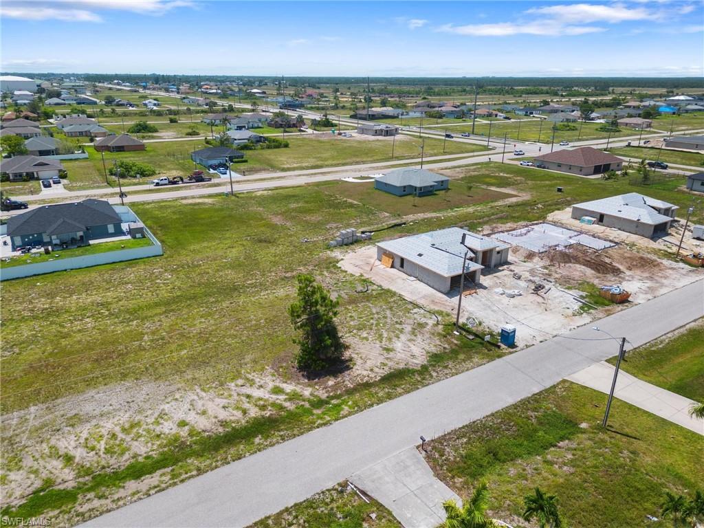 Welcome to this exceptional opportunity to build your dream home or invest in paradise! Situated in the highly desired Cape Coral area, this vacant lot offers an ideal location for the perfect lifestyle. Enjoy the beautiful neighborhood with its bike/walk and dog friendly environment. You'll be conveniently located near all shops, hospital, church and many activities that will help you maintain a healthy lifestyle. Plus, with only a few miles away from Fort Myers & Punta Gorda airports as well as Sanibel Island and Fort Myers beaches, you can enjoy living close to nature without sacrificing convenient access to travel destinations. Don't miss out on this amazing opportunity!