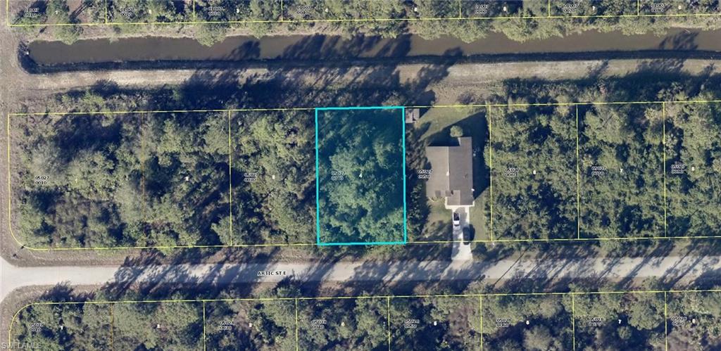One or more photo(s) has been virtually staged, AI generated or rendered.  Waterfront Canal lot in the SE area of Lehigh, make it a double as next door, #1109 Artic is also for sale, same terms, same seller. No HOA here. Whether you’re building now or holding for the future, this location delivers the perfect blend of tranquility, convenience, and long-term upside. Waterfront Canal Lot Enjoy a serene freshwater canal right in your backyard — perfect for added privacy, scenic views, and a more desirable homesite. Waterfront lots consistently attract stronger buyer interest and long-term value. High-Growth Residential Area Surrounded by new construction and ongoing development.