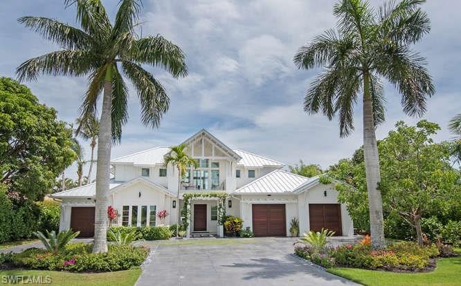JUST REDUCED $865,000 AND PRICED TO SELL! ABSOLUTELY STUNNING HOME WITH ONE OF A KIND UPGRADES. Designed by MHK Architects, this luxury residence boasts over 4,300 square feet, three bedrooms and 4.5 bathrooms. The open design and contemporary elements provide easy and stunning Florida living.  Offering open concept living, well-appointed chef’s kitchen, enviable outdoors space, spacious master retreat, generous additional guest rooms, and the latest in tech and conveniences, this residence is truly spectacular.  Enter through the custom front door to the formal foyer and living room.  All seamlessly integrated with the eat-in kitchen, family room, and two covered lanais. The line between indoor and outdoor living is delightfully blurry in this well-designed home.  The outdoor space which offers outdoor living with a sparkling pool, spa, outdoor kitchen, seating and dining areas is the centerpiece of the home.  Take a refreshing dip in the salt water pool in the privacy of your completely fenced in oasis or gather around the one-of-a-kind custom fireplace feature.  No detail was overlooked in the creation of this luxurious Naples retreat.