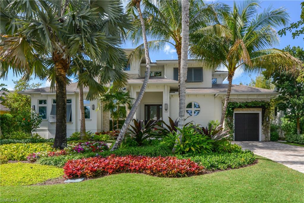 Fantastically located near the pristine Naples beaches, the Pier, and all that the renowned 3rd St S, and 5th Ave S, have to offer, comes 1600 3rd Street South. This award-winning custom home was designed by MHK architecture and constructed with quality craftsmanship by Waterside Builders. Beginning on a tropically landscaped oversized lot this home revolves around a generous wide-open interior consisting of a spacious living room, designer kitchen, and an extraordinary climate controlled outdoor living space. The home’s interior seamlessly transitions outdoors to a spa, oversized pool, a five-hole putting surface; comfortable fire pit with seating. A generous master suite with an office tucked away offers a quiet get-away space. A Lutron system provides remote control of lighting, temperature, the pool & spa, and a 65 KW whole house generator. Other special features include a 600-bottle wine room, Thermador and Miele kitchen appliances, a pantry with a gas range/oven, and second fridge to name a few. There is a two bay, climate-controlled garage with golf cart space that could easily handle a vehicle lift; a third garage in front, and as a special bonus…the golf cart is included!