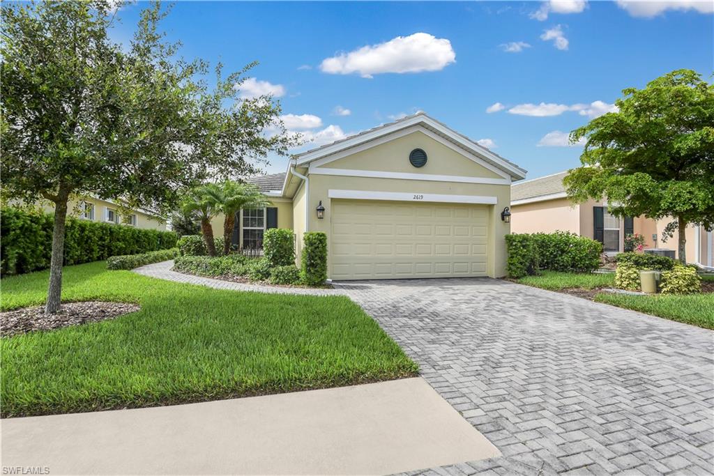The BEST of SWFL living in Sandoval! Live in one of Cape Coral's best gated communities w/ resort style amenities giving your entire family lots of activities to enjoy. Offering just under 1,700 sq. ft. of living space with great room layout, volume & tray ceilings, whole home water filtration system, spacious kitchen w/ lots of cabinet space & pantry, picture windows, upgraded tile flooring, split bedroom design, den w/ pocket French door entry, large laundry room w/ storage, an oversized screened rear lanai w/ large under truss area, and a 2 car garage. This home is perfect for seasonal or annual living, and is in a great location with easy access to Fort Myers via the Midpoint Bridge & lots of shopping/dining options. Sandoval is gated and offers a large Clubhouse w/ resort-style pool, fitness center, sand volleyball, basketball, walking paths, bocce ball, tennis & pickleball, covered playground, and horseshoe court. PLUS Calypso Park offers, disk golf, dog park, fishing pier, & grill areas.