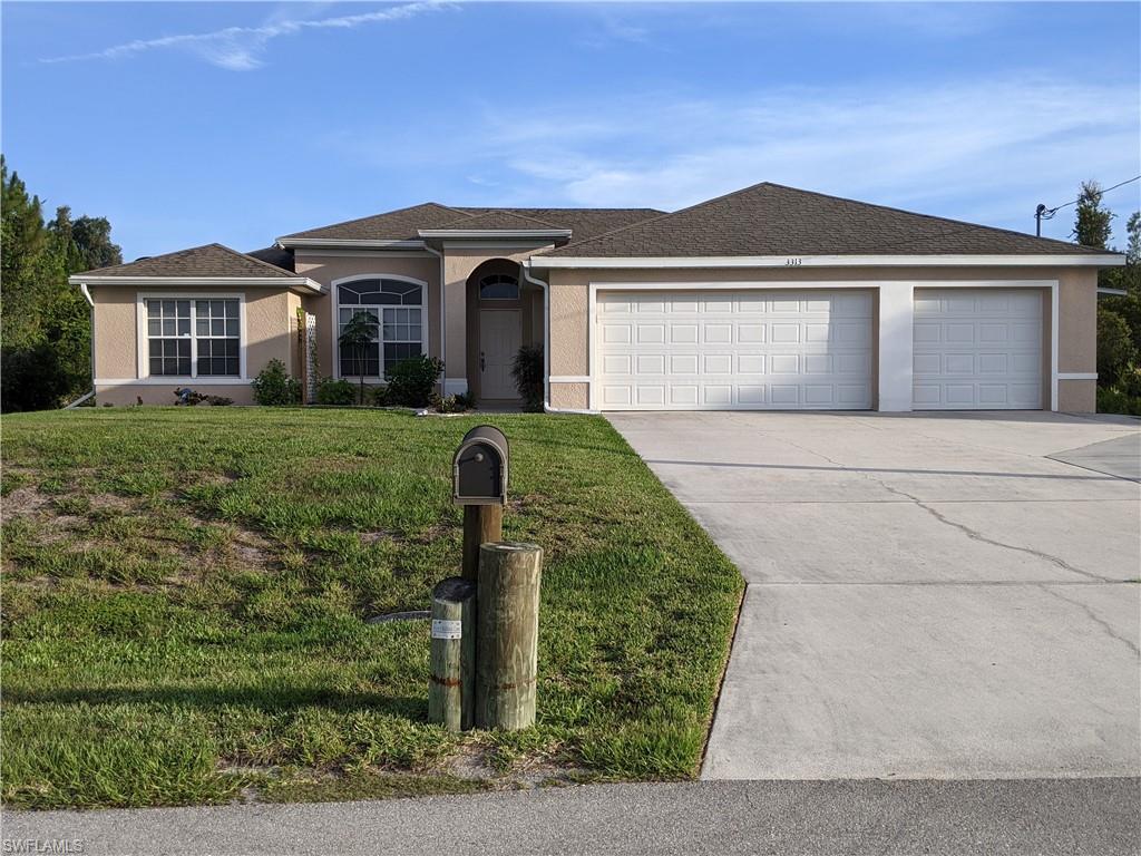 Don't blink -- this is an amazing opportunity to purchase this hidden gem amongst the trees & nature in serene Northwest Lehigh Acres -- see it to believe it! It's private country-like setting closely borders the highly-sought-after Lee County areas of Buckingham, North Fort Myers, and Alva. This 2277 sq. ft. home has a room for everything & too many amenities to list all here -- 4 BDs + Den, 2 1/2 BAs, separate dining area, beautiful island kitchen, walk-in pantry, indoor laundry room, outdoor screened-in lanai w/ covered outdoor patio just off of lanai, & newer outdoor shed. Its floorplan includes 3 separate wings off of a large great-room-style living room w/ dramatic vaulted ceilings. Enjoy entertaining/gatherings in your island kitchen w/ counter bar fit for several counter height stools & ample storage in your walk-in pantry. A separate dining area overlooks its beautiful backyard & screened-in lanai. Its well-appointed Master Suite includes a spacious Master Bathroom w/ separate shower & tub, convenient access linen closet, dual sinks & walk-in closets. Its 3-car garage provides for even more storage! This instant deal is ready for move-in -- make your offer today!
