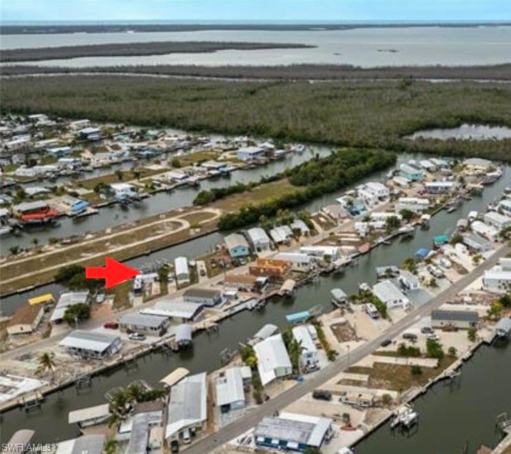 PRICE INPROVEMENT ON DIRECT GULF ACCESS WATERFRONT – UNMATCHED POTENTIAL: UPDATED PRICE ALLOWS BUDGET FOR BUILDING PLANS! Pool, Dual Boat Lifts, Seawall & Build-Ready – Now reduced to $339,000!! SELLERS SAY BRING OFFERS!!

Rare opportunity to own a direct Gulf-access waterfront property in St. James City, Florida with major infrastructure already in — saving significant time, cost, and permitting for your future build.

The previous home was lost to Hurricane Ian, offering a clean slate to design and build your custom elevated coastal home while benefiting from valuable existing improvements that are already completed.

Property features include:

• Solid seawall in great condition
• Two boat lifts (8,000 lb & 10,000 lb)
• Composite dock decking between lifts
• Direct boating access to open water
• In-ground swimming pool with pool heater
• Pool cage and spacious 12x28 lanai
• Epoxy flooring in lanai and around pool area
• Public sewer connection (no septic)
• 200 amp electric service
• 50 amp RV hookup

This is more than just a vacant lot — it is a waterfront lifestyle property with key improvements already in place. Avoid long construction timelines and rising costs associated with installing seawalls, docks, lifts, and utilities.

Build your elevated dream home to current codes and enjoy immediate access to boating, fishing, and Southwest Florida’s beautiful waterways right from your backyard.

Ideal for buyers seeking:
    •    Direct Gulf access
    •    Existing dockage and lifts
    •    Build-ready lot with utilities
    •    The ability to customize their own home

Located in a peaceful boating community known for world-class fishing, island hopping, and waterfront living.

Now Offered at $339,000
