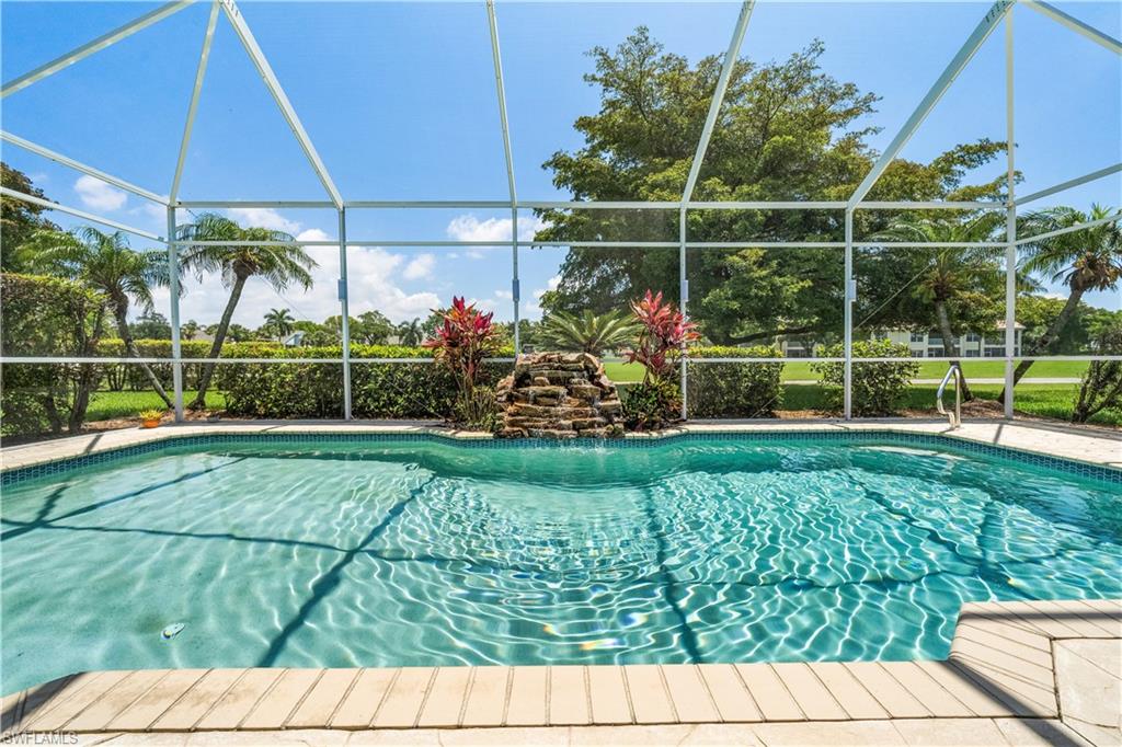 Tropical golf course views from this Gulf Harbour Yacht & Country Club pool home are waiting for you! All the space you need with 2 beds, office, & 2 baths all with a wonderful open floorplan. Enjoy your endless summers dipping into the sparkling pool featuring a tranquil rock waterfall. Pool recoated & retiled, new filter. Screened lanai w/outdoor bar area complete with sink and fridge. Sit & watch golfers on the 7th Fairway. Let the outdoors in through the large walls of pocketing sliders. Back inside, you’ll love all the recent updates including NEW UV light on AC unit,55gal water heater, pool heater & lighting, garage floor, garage & laundry room cabinets &microwave. Laundry room doubles as a butler’s pantry with ice maker & wine fridge & storage. Enjoy the beautiful kitchen with custom cabinetry & granite countertops. Additional fine finishes include tile flooring throughout, crown molding, plantation shutters, updated baths, new paint, lighting and fans. Primary suite features a large walk-in closet & bath with dual sinks, & frameless glass shower. Office with French doors and built-in murphy bed. Don’t miss the walk-thru video. No membership with this home.