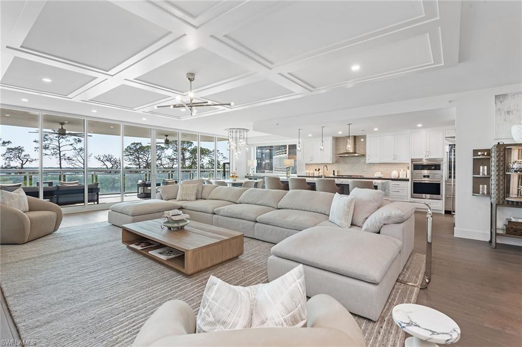 Welcome to the newest occupied building in the vibrant community of Kalea Bay! This stunning end-unit residence offers unobstructed, picture-perfect sunset views over the sparkling bay and gulf waters.
Designed by a renowned local designer and furnished with exquisite Restoration Hardware pieces, this home is move-in ready—allowing you to instantly embrace the luxury Naples lifestyle.
Featuring four spacious bedrooms and an open great room floor plan, the residence is highlighted by a chef’s kitchen and prep area, perfectly suited for entertaining and family gatherings. The luxurious primary suite boasts floor-to-ceiling windows, framing panoramic sunset views you’ll never want to miss. Step onto the expansive lanai to savor your morning coffee or relax with evening cocktails.
Located directly across from The Club at Kalea Bay, you’ll enjoy access to an unmatched array of world-class amenities:
 • Fine & casual dining venues
 • Open-air poolside bar & restaurant
 • State-of-the-art fitness center with Pilates, spin & Technogym
 • Spa services
 • Pickleball & tennis courts
 • Guest cottages
 • Game room & so much more.
Life at Kalea Bay is truly unparalleled—a perfect blend of elegance, comfort, and coastal beauty.