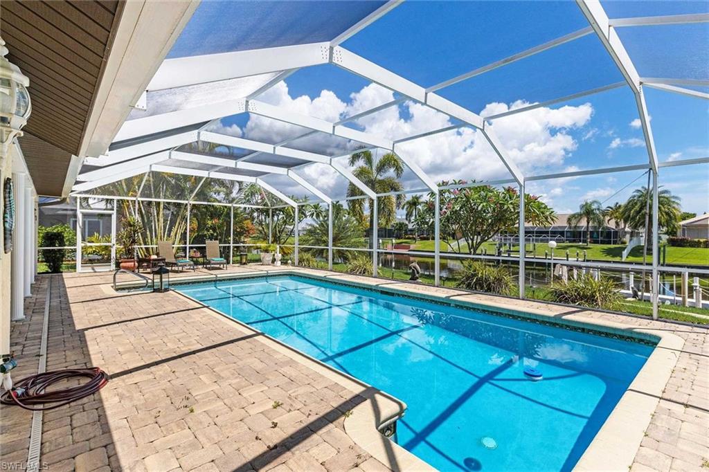 This is a VACATION RENTAL only. Owner will not consider annual rentals. Weekly rentals are welcome.
Villa Aqua Sonne Oasis is a 3-bedroom, 2-bathroom property on a gulf access canal with an electric heated pool. This home sleeps a maximum of 6 guests (including children) and will accommodate up to 2 pets that do not exceed a combined weight of 35 lbs. Please inquire for possible pet exceptions. Please note that the boat lift is NOT available for guest use)

· · · · · PROPERTY PERKS · · · · ·
- Pet friendly
- Bicycles

· · · · · LOCATION · · · · ·
- Located in Southeast Cape Coral
- Close to Horton Park & Boat Ramp
- Close to Four Mile Cove Ecological Preserve
- Close to Del Prado Blvd. with plenty of shopping & dining
- A short drive to Midpoint Bridge, which leads you to Fort Myers/Fort Myers Beach

· · · · · LIVING AREAS · · · · ·
- Flat-screen TV
- Comfortable seating

· · · · · KITCHEN & DINING · · · · ·
- Fully equipped
- Dining area with seating for 6

· · · · · BEDROOMS · · · · ·
- Primary Bedroom: King bed, sliders to the pool & flat-screen TV
- 2 Guest Bedrooms: 1st has a King bed, sliders to the pool & flat-screen TV, 2nd has two Twin beds

· · · · · BATHROOMS · · · · ·
- Primary Bathroom: Shower & single-sink vanity
- Guest Bathroom: Shower, single-sink vanity & doubles as the pool bathroom

· · · · · OUTDOOR LIVING · · · · ·
- Electric heated pool
- Southern pool exposure
- Dining area with seating for 6
- Sun loungers
- Grill
- Additional loungers & seating by boat dock
- Boat dock (boat lift NOT available for guest use)

· · · · · THIS HOUSE IS GREAT FOR · · · · ·
Families, travelers looking for a minimalistic gulf access property