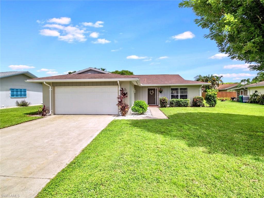 Totally updated within past 3 years including newer kitchen cabinets, newer stainless steel appliances, granite counters in kitchen and baths, newer tile floors, updated baths with all new tiled shower and tub, newer AC and hot water heater. Great central location and neighborhood close to the beaches, schools, shopping, and airport.  The home features a large patio with sliding glass doors that can be removed if someone would rather have a screened outdoor space. This neighborhood sells fast so don't miss a great opportunity.