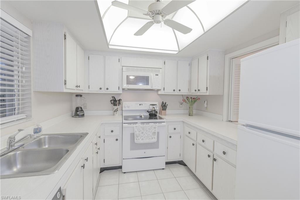 Welcome to Golf View Manor, An ALL Ages Community overlooking the Royal Palm Golf Course at Lely! 
When you come home, enjoy covered carport parking, and take the elevator up to this top 3rd Floor condo, which has been impeccably, well-kept, featuring newer ac and appliances for you. The 2 bedroom split floor plan is great when you have guests and the master bedroom features a spacious walk-in closet.
Golf View Manor features a clubhouse and grill area overlooking the pool for you to relax and enjoy time with friends and family. Have fun at nearby, 18 Hole, Lely Hibiscus, Public Golf Course and only pay as you play - No Membership is required. Tons of shopping, business services, along with a hospital are located within a 3 mile radius. The beaches of Downtown Naples are 5 Miles away. This condo can be enjoyed year round or seasonally, with the option to rent it out short or long term. Low Fees of only $1050 a quarter make this a affordable place to call home. Come see it today!