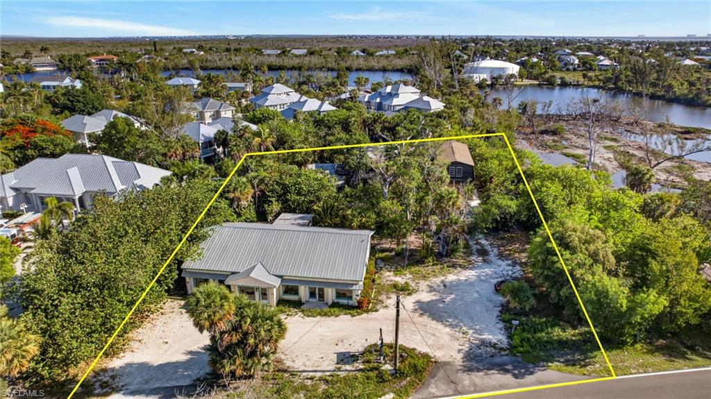 A rare opportunity to secure one of the most visible and strategically positioned commercial assemblages on Sanibel Island's iconic Periwinkle Way corridor. Offering approximately 150 feet of prime frontage along the island's primary commercial artery, 1444 and 1446 Periwinkle Way present a unique chance to shape the future of one of Sanibel's most recognizable locations. The combined offering includes three existing structures spread across two commercial parcels, creating exceptional flexibility for investors, owner-users, developers, retailers, restaurants, garden concepts, professional offices, wellness destinations, galleries, showrooms, mixed-use redevelopment, and countless other possibilities. Imagine revitalizing the existing buildings into a collection of charming Old Florida commercial spaces, creating an inviting courtyard-style destination, or starting fresh with a completely new vision designed to maximize visibility, parking, and customer experience along one of the island's highest traffic corridors. Opportunities of this scale, frontage, and flexibility rarely become available on Sanibel, where commercial land has historically remained tightly held for decades. There has never been a more exciting time to invest in Sanibel's future. The island is experiencing a remarkable rebirth as businesses rebuild, reinvent, and reimagine what comes next. New concepts, new architecture, and new energy are returning to the Sanctuary Island, creating an environment unlike any other point in recent history. As long-established properties transition to new ownership and new ideas, buyers have a rare opportunity to become part of the next chapter of Sanibel's commercial evolution. Adjacent to the Bailey Homestead Preserve and Garden Center and neighboring the lands of SCCF, this highly visible location combines natural beauty with exceptional exposure and accessibility. Whether your vision is restoration, redevelopment, investment, or creating an entirely new island destination, 1444 and 1446 Periwinkle Way offer the location, flexibility, and visibility to bring that vision to life. Prime commercial frontage. Exceptional visibility. Endless possibilities. The future of Sanibel is being written now and this is your opportunity to help shape it.