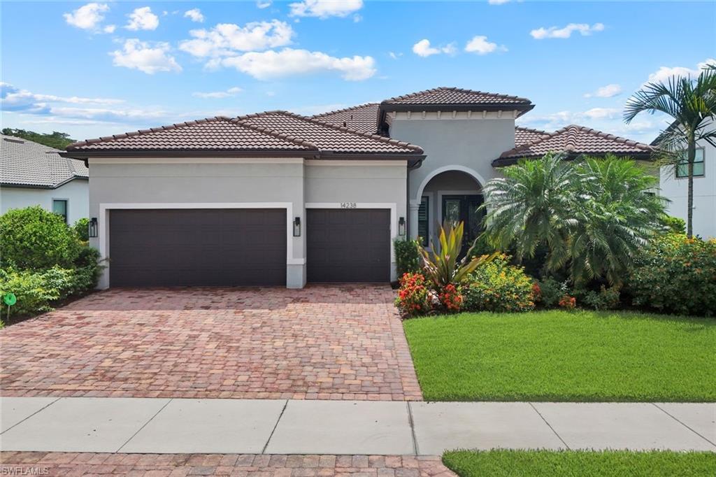 Experience the best of Southwest Florida living in this beautifully appointed Pinnacle model located in the highly desirable gated community of Corkscrew Shores. Situated on a premium lakefront lot with tranquil preserve views and no rear neighbors, this 3-bedroom + den, 3-bath residence offers the perfect combination of privacy, luxury, and resort-style amenities. The open-concept floor plan features a spacious great room with zero-corner sliding glass doors that seamlessly blend indoor and outdoor living. The gourmet kitchen boasts white cabinetry, granite countertops, an oversized island, walk-in pantry, and beverage station with wine cooler. The owner's suite offers a peaceful retreat with a large walk-in closet and spa-inspired bath, while two guest bedrooms, including an ensuite, provide comfort and privacy for family and visitors. Step outside to your screened lanai featuring a heated saltwater pool and spa with cascading waterfall, picture-window screen enclosure, and covered outdoor living area with hookup for a future outdoor kitchen. Additional highlights include hurricane impact windows and doors, a 3-car garage with epoxy flooring, and a quiet cul-de-sac location. Corkscrew Shores residents enjoy an exceptional amenity center with a resort-style pool, restaurant and bar, fitness center, tennis, pickleball, bocce, kayaking, fishing pier, and more, all centered around a stunning 240-acre lake. Conveniently located near RSW Airport, FGCU, shopping, dining, and entertainment. No CDD fees and not located in a flood zone.