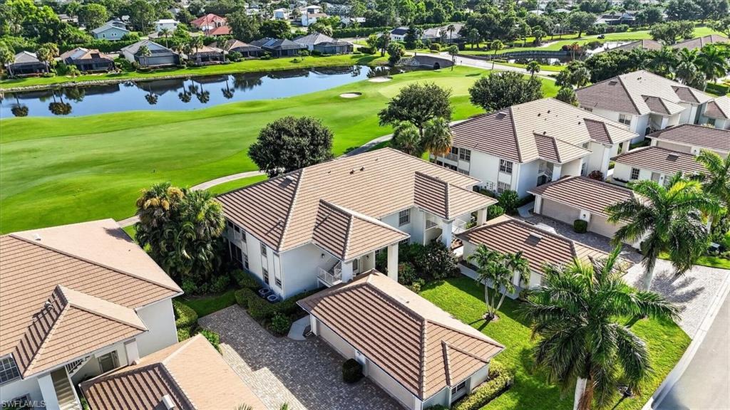 Welcome to The Vines Country Club in the heart of Estero! This beautifully maintained first floor corner condominium offers a split floor plan with 2 bedrooms and 2 baths and a 2 CAR GARAGE!. The open great room floor plan seamlessly combines the living and dining areas, while the intimate breakfast nook just off the kitchen provides the perfect spot to have additional dining space for those every day occasions. Split floor plan for the bedrooms offers privacy, however both bedrooms have access to the screened lanai. Freshly painted with newer carpeting, this move in ready home also features stainless steel appliances in the kitchen. Golf Course views from the primary and wrap around screened lanai. The lanai has shutters for when your away or inclement weather. Grand Palm offers a community pool and extra guest parking. The Vines Country Club offers a variety of membership levels, allowing you to enjoy amenities that include a beautifully appointed clubhouse, fitness center, pickleball, tennis courts and on-site dining. Ideally located with convenient access to Southwest Florida International Airport, world class shopping, restaurants and the Gulf Coast white sandy beaches! This is your opportunity to enjoy the Florida lifestyle in one of Estero's most desirable communities.