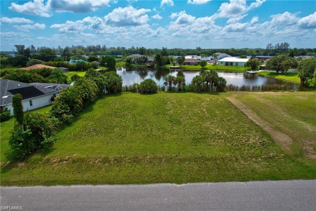 Welcome to the beautiful Kings Bay Estates! Searching for the ideal location to build your dream home? Look no further! This cleared lot offers tranquil water views and is ready for you. With a low annual HOA fee of $800, it's a great deal. Moreover, Sweet Water Marina is conveniently located nearby, providing easy boat storage and launch facilities. Situated just minutes away from Babcock Ranch, Publix, Lee Civic Center, I-75, and more. Don't let this one pass you by, bring your offer today!