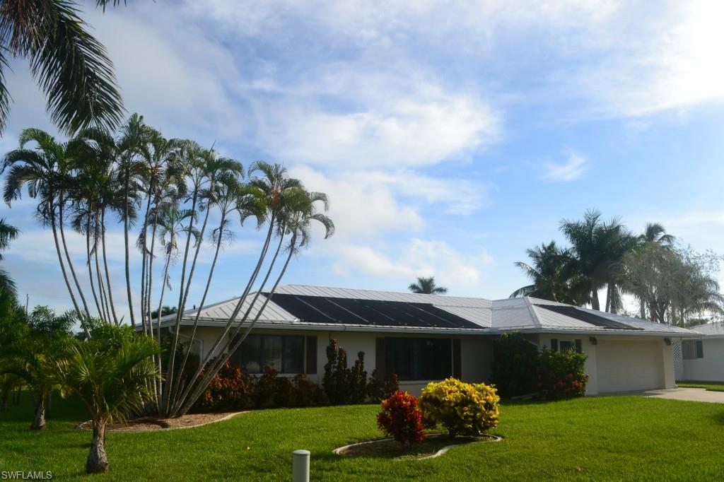 ATTENTION BOATERS, SNOWBIRDS & INVESTORS TOO !!! This 3 Bedroom 2 Bath Pool Home Offers Quick Water Access In One Of Pine Islands Destination Neighborhoods !!! Great Place To Park Your Boat, Spend 6 Months Of The Year Or Update And Resell. Extra's Include A Metal Roof, Solar Heat In The Pool, Covered Boat Lift, Pocket Doors To The Bedrooms. Wall Oven In The Kitchen And Plenty Of Closets And Storage Throughout. Call Today Before This One Is Gone !!!