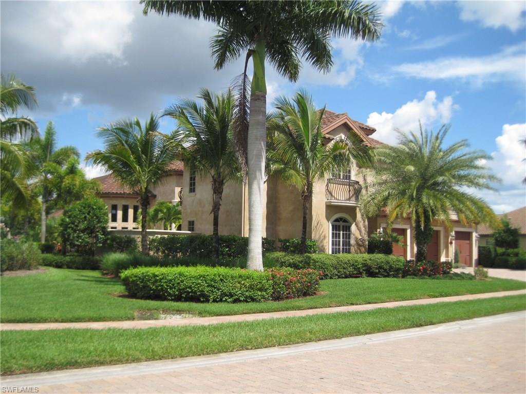 NAPLES, TREVISO BAY *** GOLF, TWO CLUBHOUSES & ALL AMENITIES INCLUDED *** This magnificent 2-story former Executive Model Home with Cabana was built by Jon Rubinton a Port Royal approved builder and has over 4,700 square feet under air.  The home offers complete privacy and comes tastefully Furnished.  The modified Catania II Floor Plan encompasses 5 Beds, 5.5 Baths, Den and Loft, including a pool bath.  This lakefront home also includes a 2-story guest Cabana, private gated entry and 3-car attached garage.  Open floor plan concept, large coffered ceilings, exquisite millwork, gourmet gas island kitchen, state of the art appliances, Lutron lighting system, California closets, custom drapes, impact windows and doors.  The large outdoor area with privacy wall to side features a tropical pool and spa with custom rock treatment and covered gas kitchen ideal for outdoor entertaining.  Intricate attention to detail and craftsmanship throughout.  Located amongst luscious landscaping at the entrance to Italia with its paved roads, driveways and sidewalks directly across from the Sports Clubhouse.  Only TPC/PGA Golf Course in SWFL with Nationwide reciprocation.