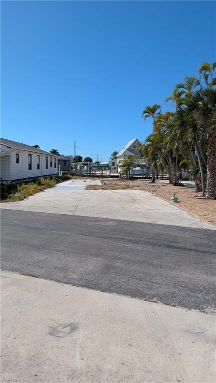 Discover coastal living at its finest with this charming lot located in Fort Myers Beach, FL. It is being sold with 59 nancy lane giving the owner close to 70 feet frontage for multiple boats and toys