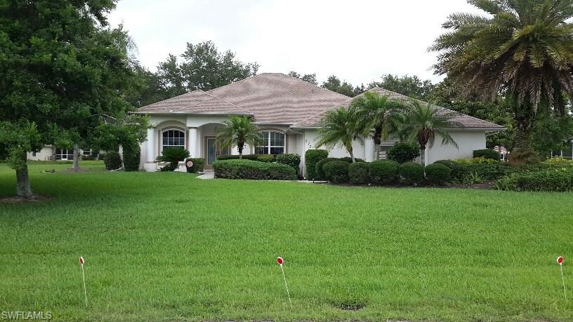 Motivated Seller just made a substantial price decrease on this lovely home in a deed restricted area placed on 2 combined lots giving you  approx.3/4 acres.  The home has 3 bedrooms, 2 baths and a 3 car garage.  The bedrooms are split and the master opens onto the florida room which is spacious giving you a wonderful area for your leisure and party time. Your view from the florida room is relaxing as it overlooks the lawn  There is also a separate area for dining as well as a breakfast bar and a dinette area.  
As you enter the home you are greeted by a feeling of space with the high ceilings and shelves. Call me or your Realtor for your private showing. This home is located on two lots and the mailing address is 272 Rotonda Blvd.N

Realtors please read the remarks concerning showings.