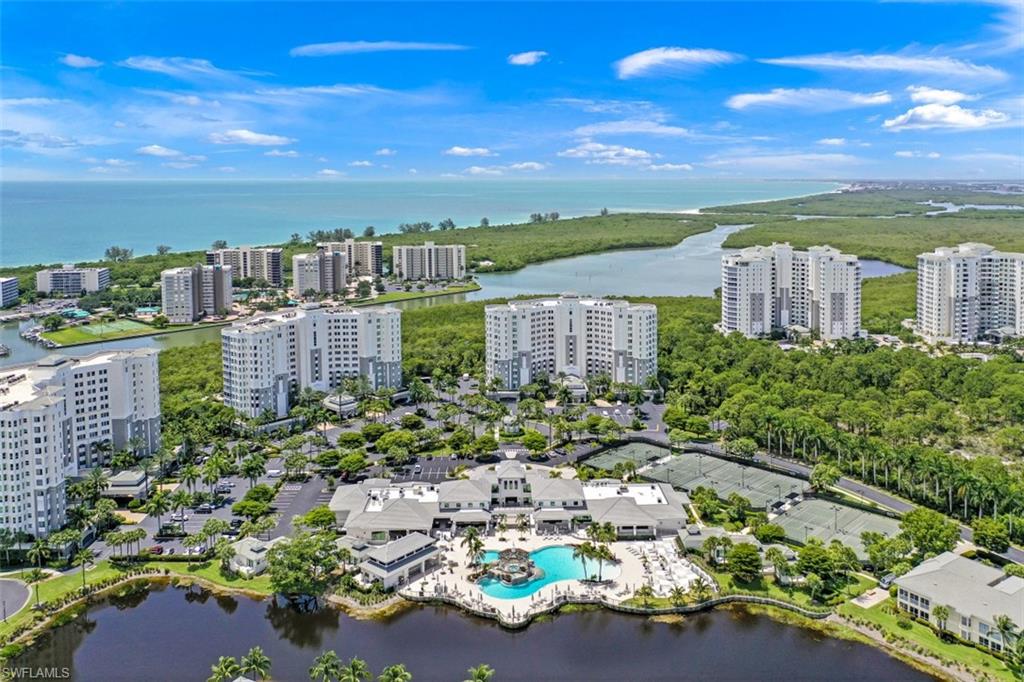 See Virtual Tour. Million Dollar panoramic views of the Gulf of Mexico and Turkey Bay from this beautiful condo. The open floor plan features 3 bedrooms and 2 baths in 1,950 square of living space. The Master Suite boasts stunning water views and the two Guest Suites are separated from the master, providing ultimate privacy for you and your guests.  The kitchen also offers gorgeous views and new SS appliances. Kick back on the lanai and watch Ospreys soaring over Turkey Bay and sunsets over the Gulf. Cayman residents enjoy underground parking, ample guest parking, a community pool and spa, and covered barbecue area. A short walk from your lobby is award winning Vanderbilt Beach; and, just steps away is The Club at The Dunes, the hub of Dunes activities. Amenities include a huge resort pool, tiki bar, fine dining restaurant, indoor/outdoor bar, world-class fitness center and staffed tennis facility, all included in your HOA dues. Managed by Troon Privee', The Club was recently honored with the 2021 Royal Fork Award by Golf Inc. Magazine. This is your opportunity to own a beautiful high floor condo in the Premier 5 Star Resort Community of The Dunes. The Dunes is Pet Friendly!