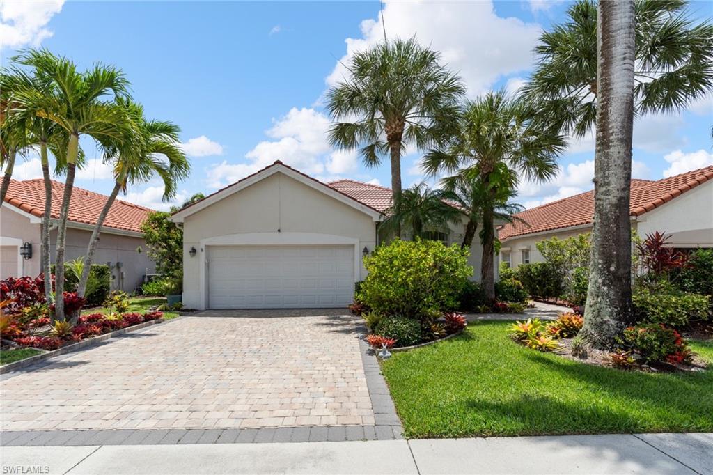 One or more photo(s) has been virtually staged, AI generated or rendered.  Welcome to Sabal Lake, one of Naples' most peaceful and well-established communities with very low HOA fees, where mature landscaping, sparkling lakes, and a relaxed neighborhood atmosphere make every day feel like a retreat. Tucked on a quiet cul-de-sac with serene lake views, this two-bedroom plus den, two-bath single-family home offers the space, privacy, and charm that Sabal Lake is known for.
From the moment you enter, you're welcomed by vaulted ceilings, an open kitchen and living area, and natural light that carries through to the screened lanai beyond. The home was recently painted throughout and features updated luxury vinyl flooring. The split bedroom floor plan creates comfortable separation between the primary suite and guest accommodations, while the den offers flexibility, equally suited as a home office, guest room, or quiet retreat. The primary bedroom features lake views, a generous walk-in closet, and a well-appointed ensuite with dual vanities and a walk-in shower. Step outside to the extended screened lanai where a private heated hot tub awaits - the perfect spot to unwind at the end of the day. Hurricane shutters throughout provide added peace of mind year-round.
As a Sabal Lake resident, you'll enjoy access to a community pool, spa, clubhouse, tennis and pickleball courts, and scenic walking paths - all for one of the lowest HOA fees in Naples.
With restaurants and shopping just moments away, the Gulf beaches, Fifth Avenue South, and everyday conveniences all within easy reach, this is Naples living at its most effortless.