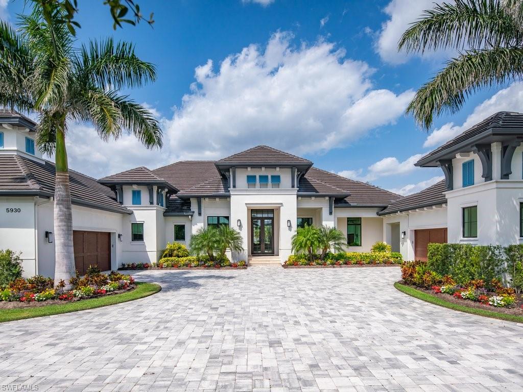 Gorgeous Custom home on over an acre parcel. Exquisite attention to detail throughout from the grand entry to the fantastic outdoor living spaces accessed with pocketing sliders to create seamless flow. 4 spacious bedrooms - each ensuite, with the master an oasis in itself with private seating area and morning coffee bar leading to a spa inspired bath for full relaxation. The gracious den works as a wonderful flex area, ideal for office, yoga/meditation space. Enjoy creating culinary masterpieces in the well-appointed kitchen, anchored with a generous island w waterfall edge, Sub Zero appliances and open to the great room for wonderful entertaining possibilities. Offering luxurious light fixtures throughout, home automation system, and beautiful natural lighting to maximize your SWFL days! Serene Golf Course views with comfortable Northern exposure and overlooking your private sparkling, heated pool and spa from the abundant covered, outdoor living spaces.